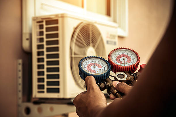 Professional Air Conditioning Service technician working in Jay, OK